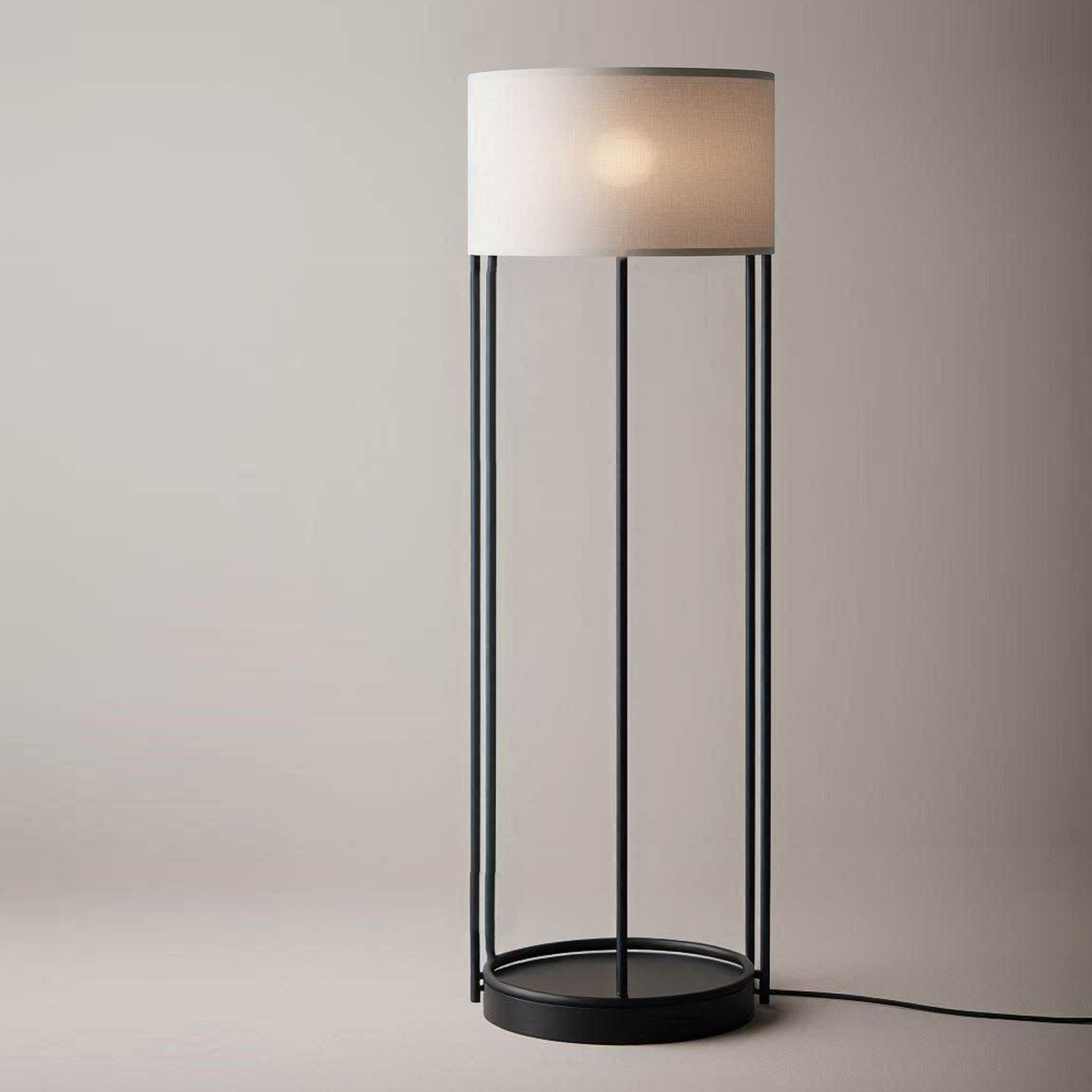 A sophisticated floor lamp with a minimalist black metal frame and an elegant cylindrical beige shade. The lamp is switched on, emitting a warm glow, and stands against a neutral background.