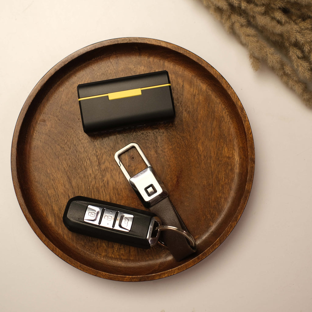 A thoughtfully curated tablescape with floral centerpieces, artisanal ceramics, and ambient lighting, perfect for a refined dining experience.