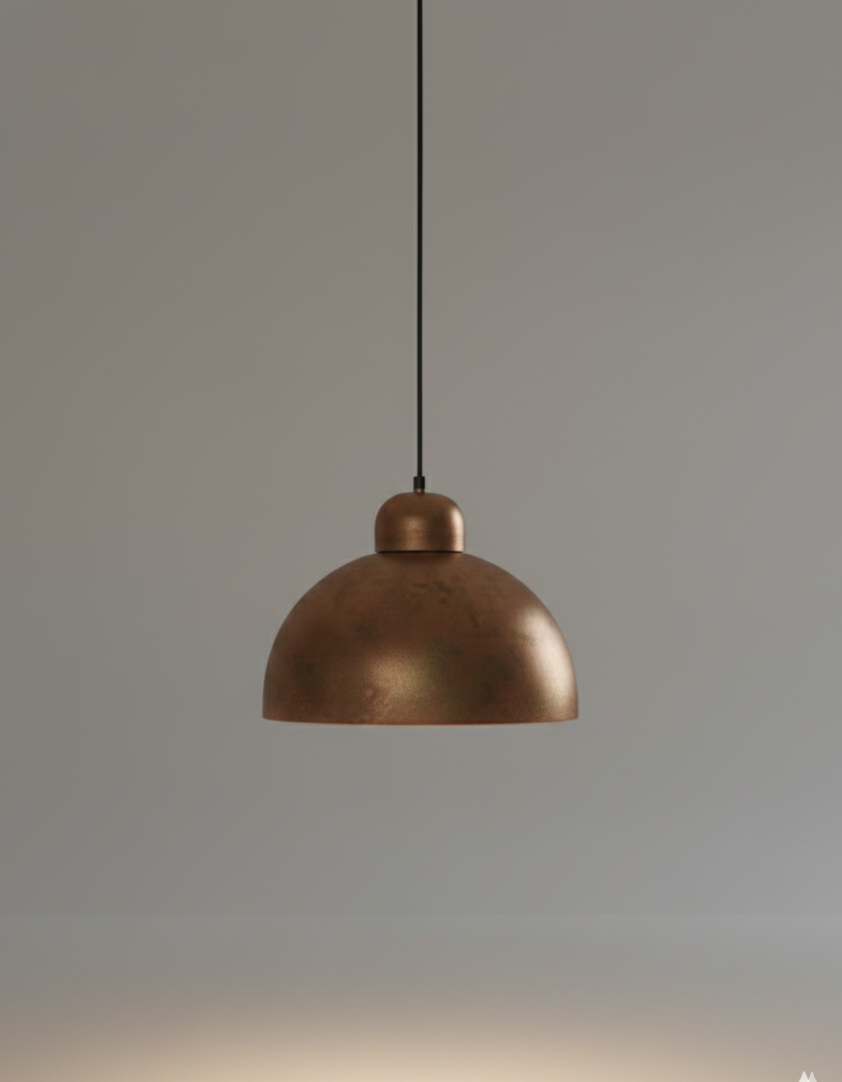 Bronze pendant light against a gray background