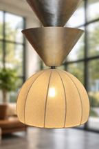 Decorative pendant light with a modern design in an indoor setting