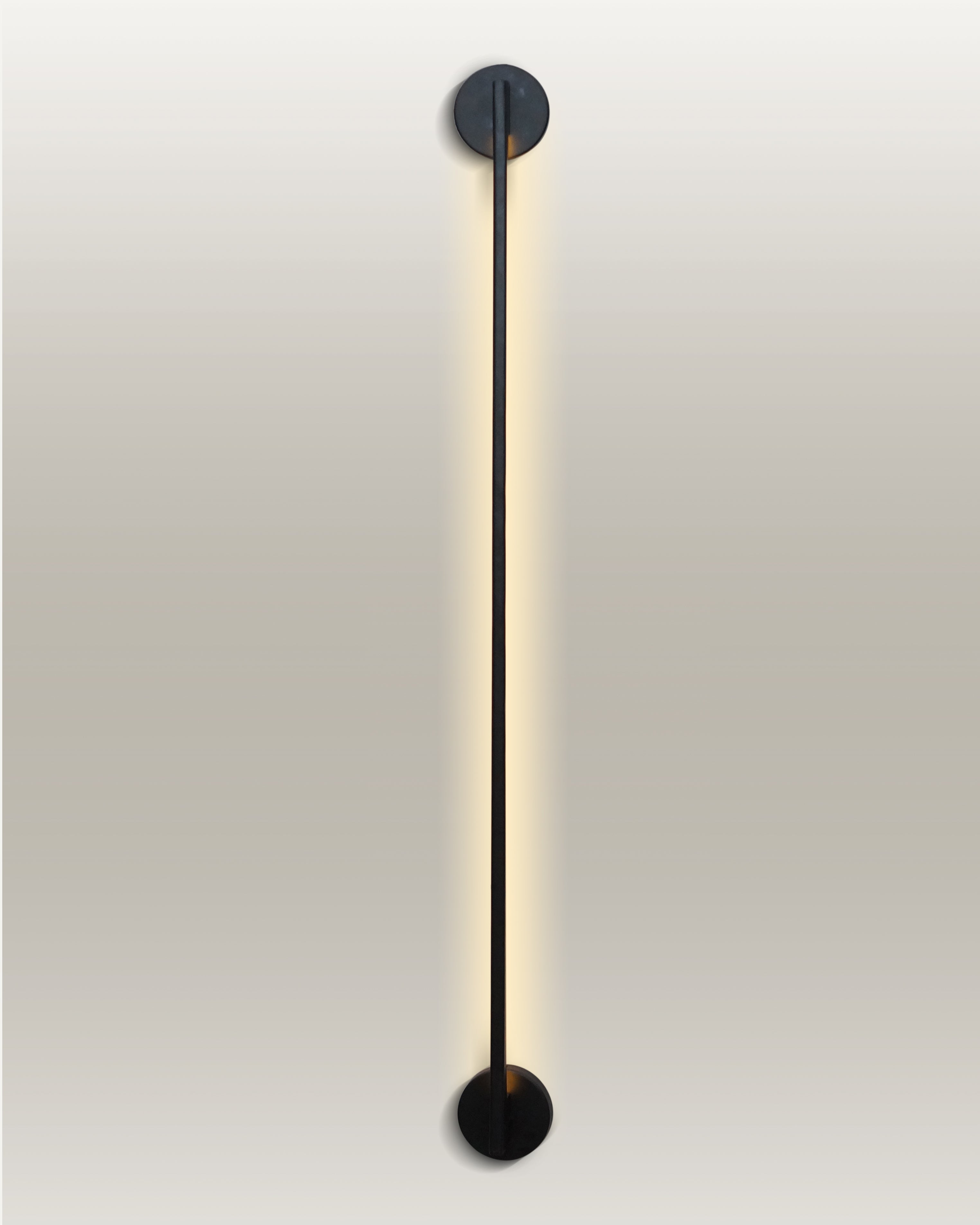 Elegant LED wall lamp with a long, slender black rod, offering consistent and soft illumination