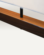 Elegant pendant light with warm, diffused lighting and a touch of natural texture.