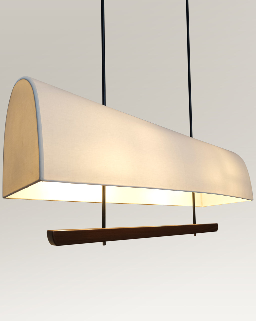 Industrial chic pendant light featuring a natural wood element and minimalist design."