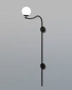 Modern Glamour Arch Wall Lamp with a gracefully curved black arm and warm, ambient lighting from a white shade