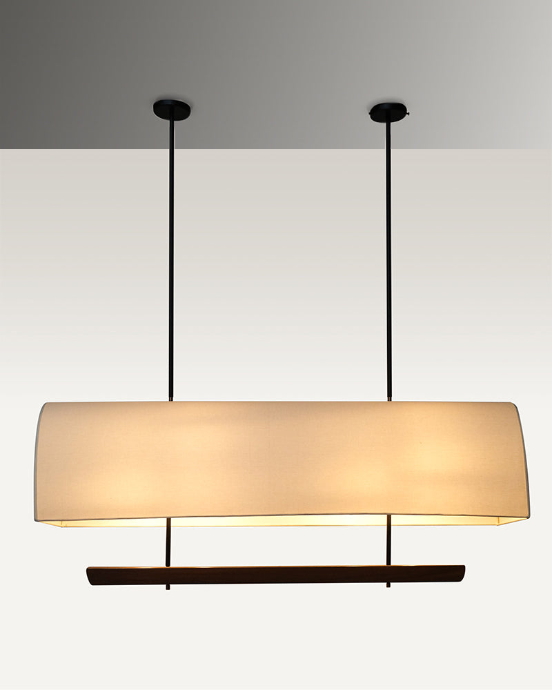 Sleek and modern industrial luxe pendant dining light with a rectangular fabric shade