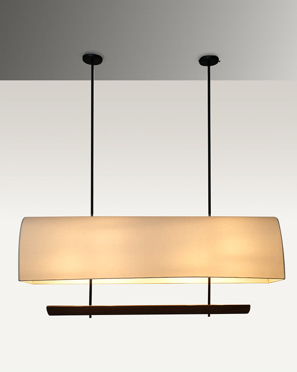 Sleek and modern industrial luxe pendant dining light with a rectangular fabric shade