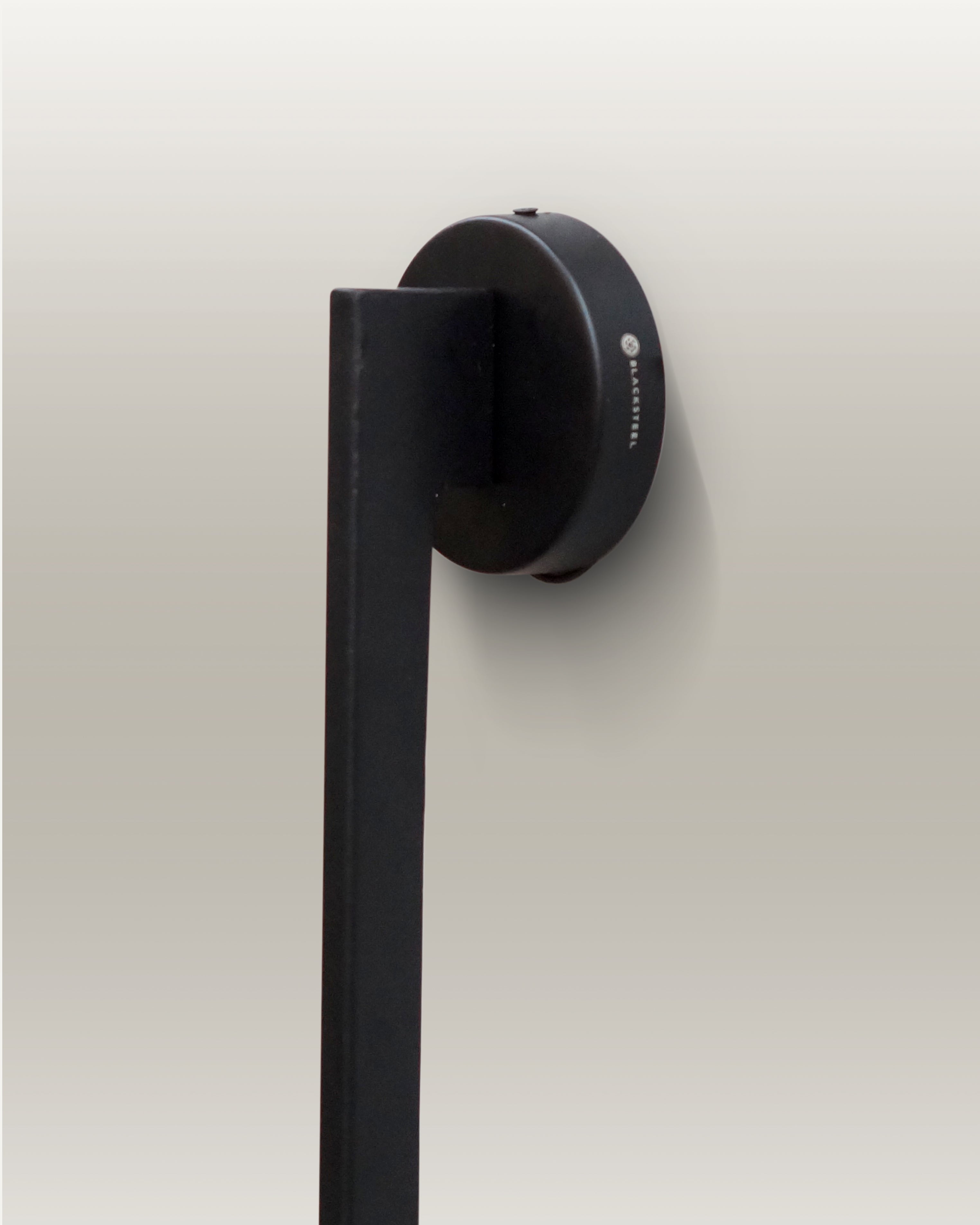 Sleek black LED wall lamp providing soft, energy-efficient lighting, perfect for contemporary interiors