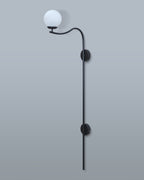 Sophisticated black metal wall lamp with a spherical white lampshade, perfect for creating a cozy ambiance