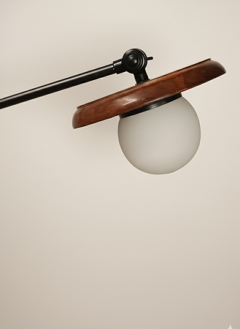 Wall-mounted lamp with wooden shade and white bulb on a beige background