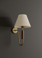 Wall-mounted wooden light creating soft, calming illumination for resort and hospitality spaces.