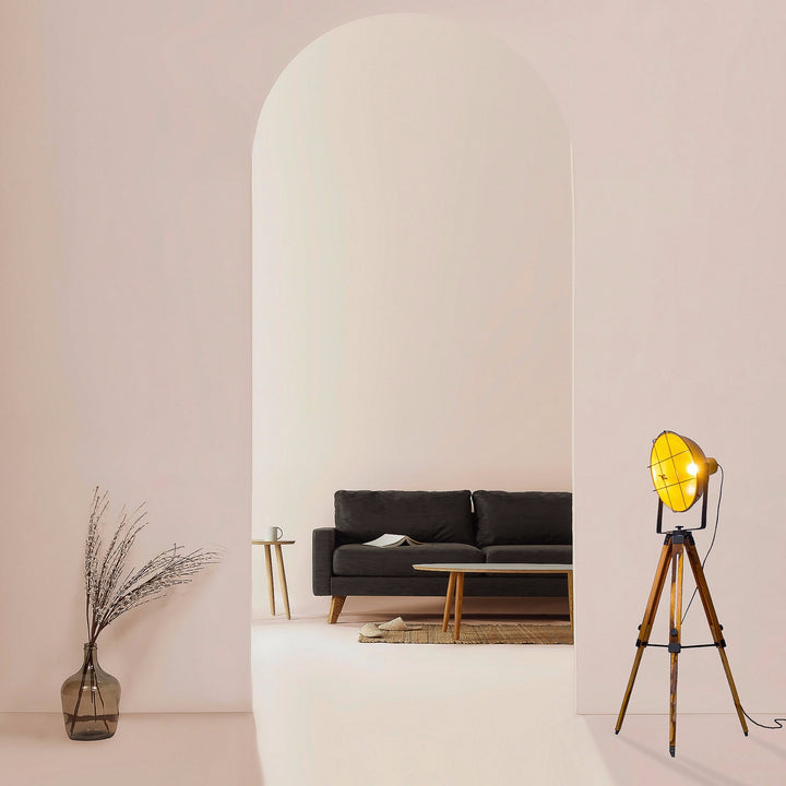 tripod floor lamp golden shade with black grill